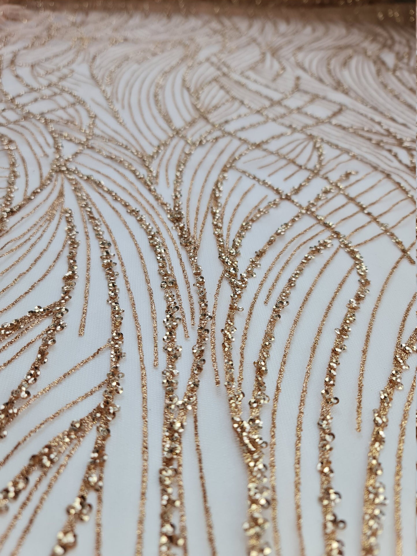 Glitter fabric with sequins in roségold, gold or blue color, net fabric with abstract design