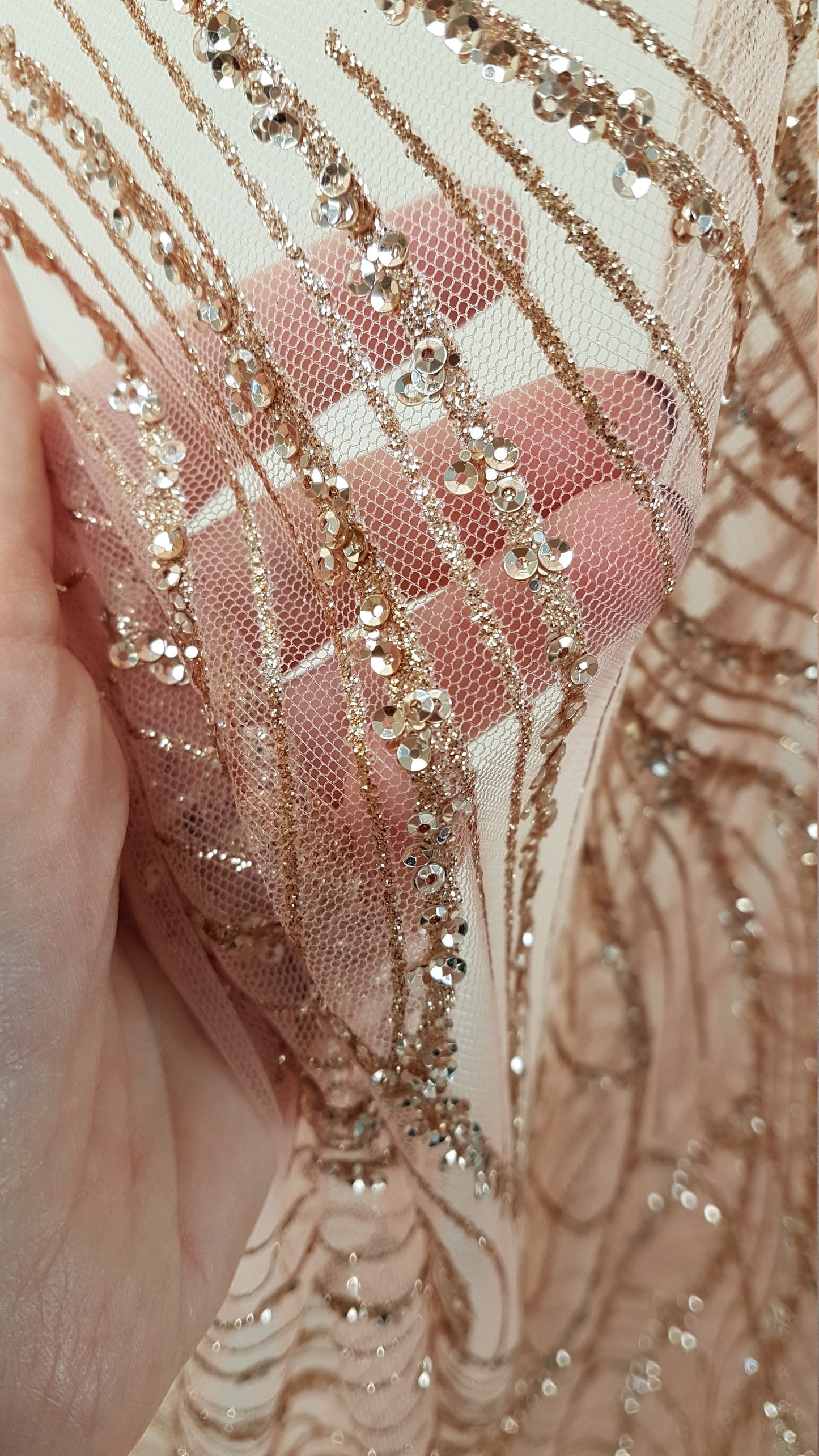 Glitter fabric with sequins in roségold, gold or blue color, net fabric with abstract design