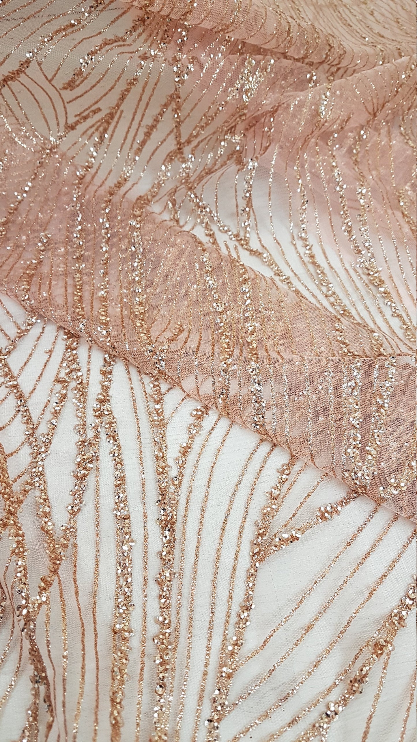 glitter tulle fabric in wave design in gold, rosegold and blue color