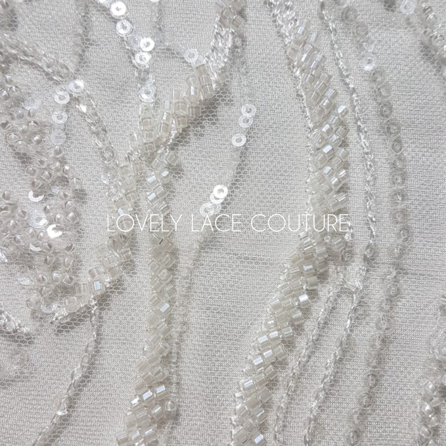 LL-1374, luxurious bridal lace fabric with modern abstract wave pattern in off-white color, starts at 0,5Meter