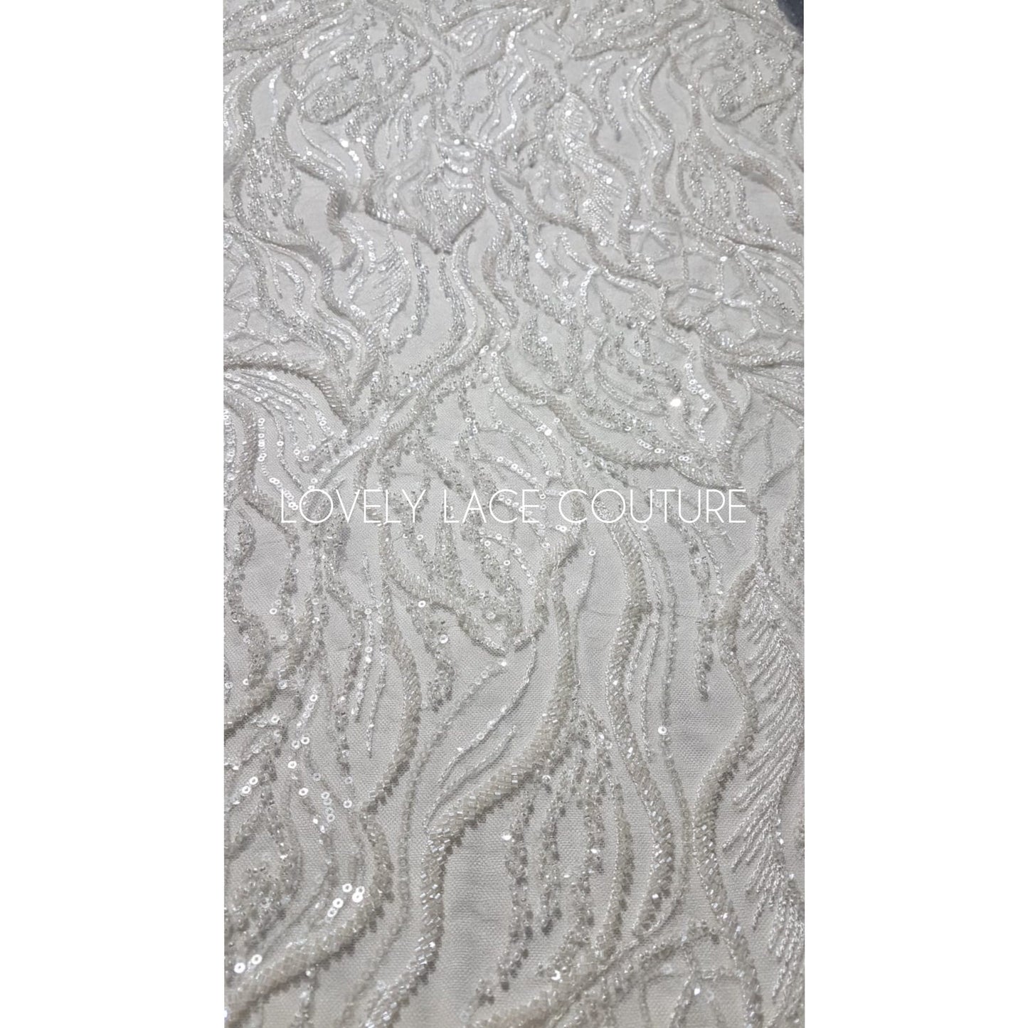 LL-1374, luxurious bridal lace fabric with modern abstract wave pattern in off-white color, starts at 0,5Meter