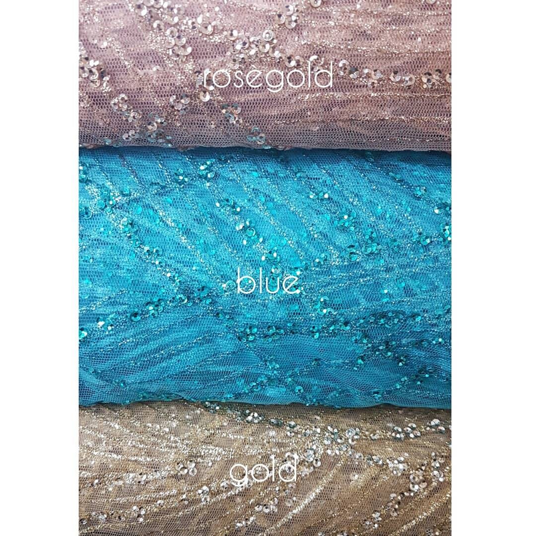 Glitter fabric with sequins in roségold, gold or blue color, net fabric with abstract design