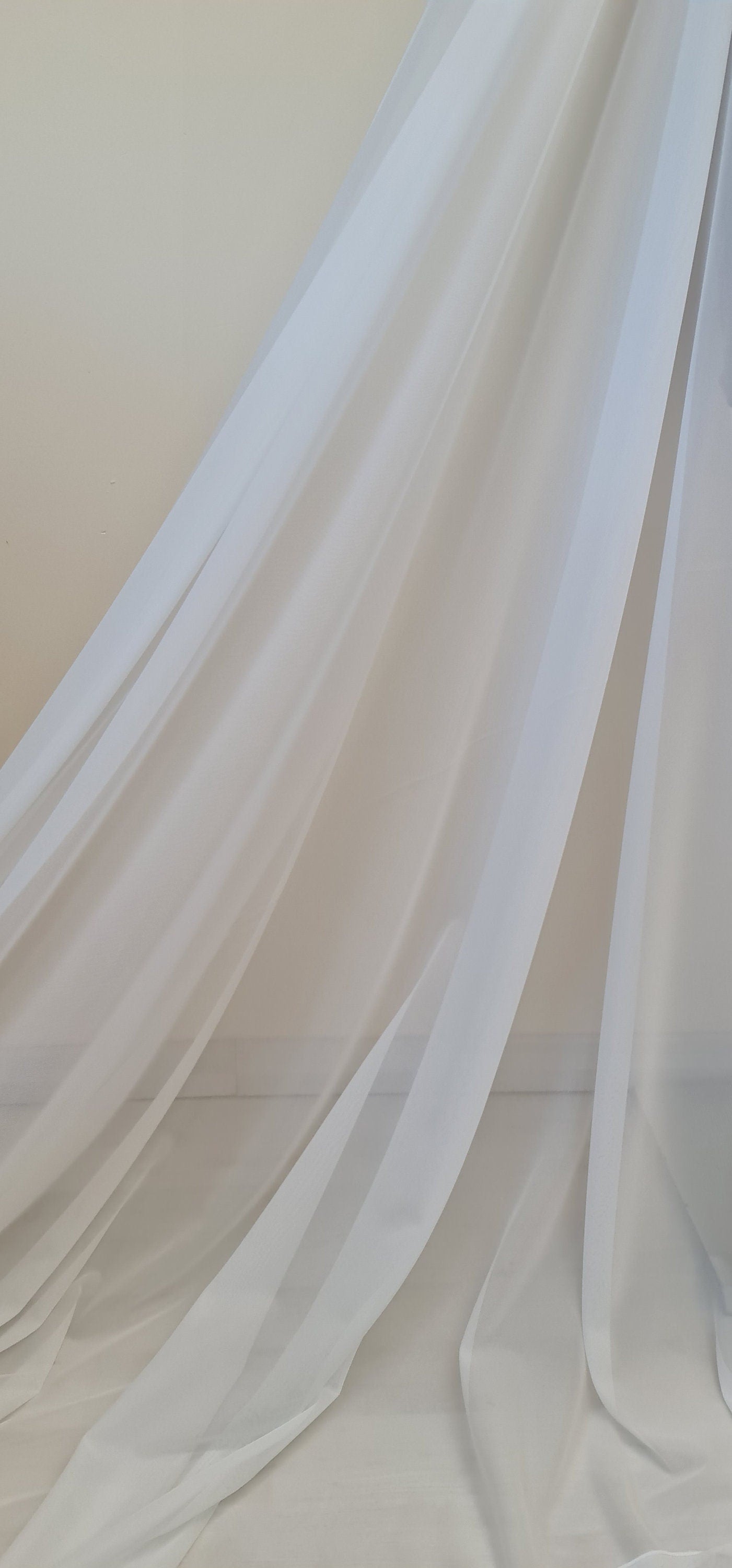 100cm length, 160cm wide, transparent Mesh Fabric in light-ivory color, slightly stretchy, perfect as lining for bridal dresses