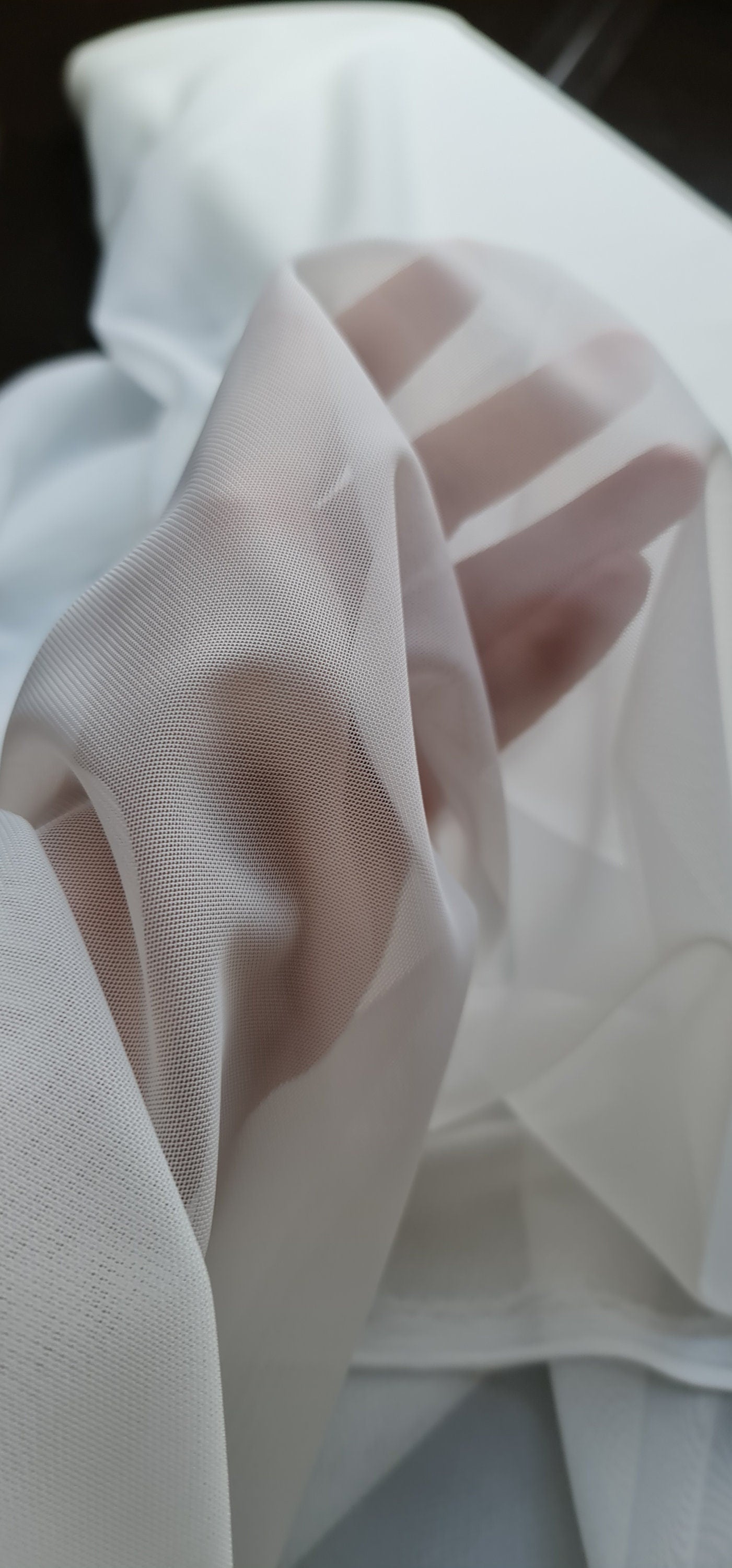 100cm length, 160cm wide, transparent Mesh Fabric in light-ivory color, slightly stretchy, perfect as lining for bridal dresses