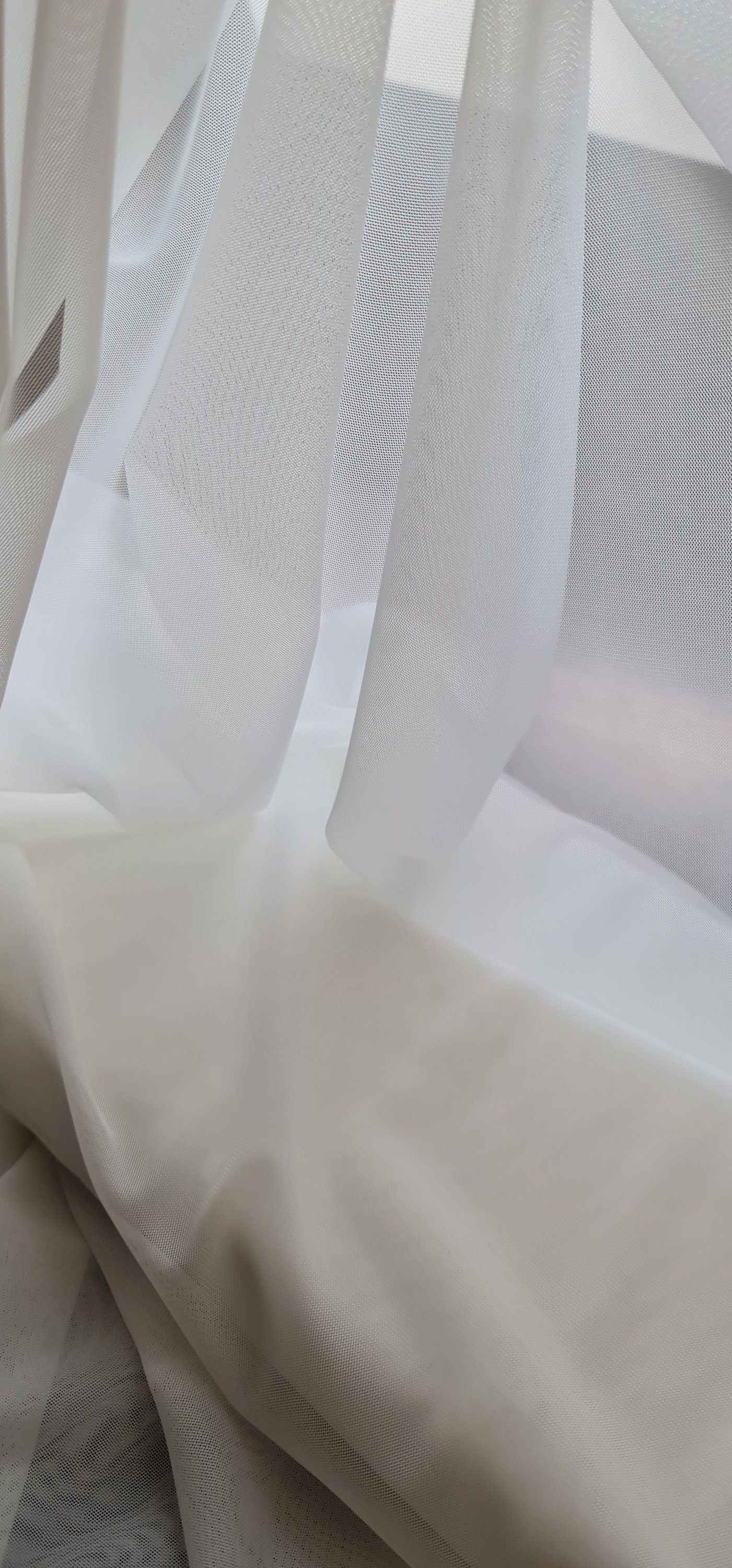 100cm length, 160cm wide, transparent Mesh Fabric in light-ivory color, slightly stretchy, perfect as lining for bridal dresses