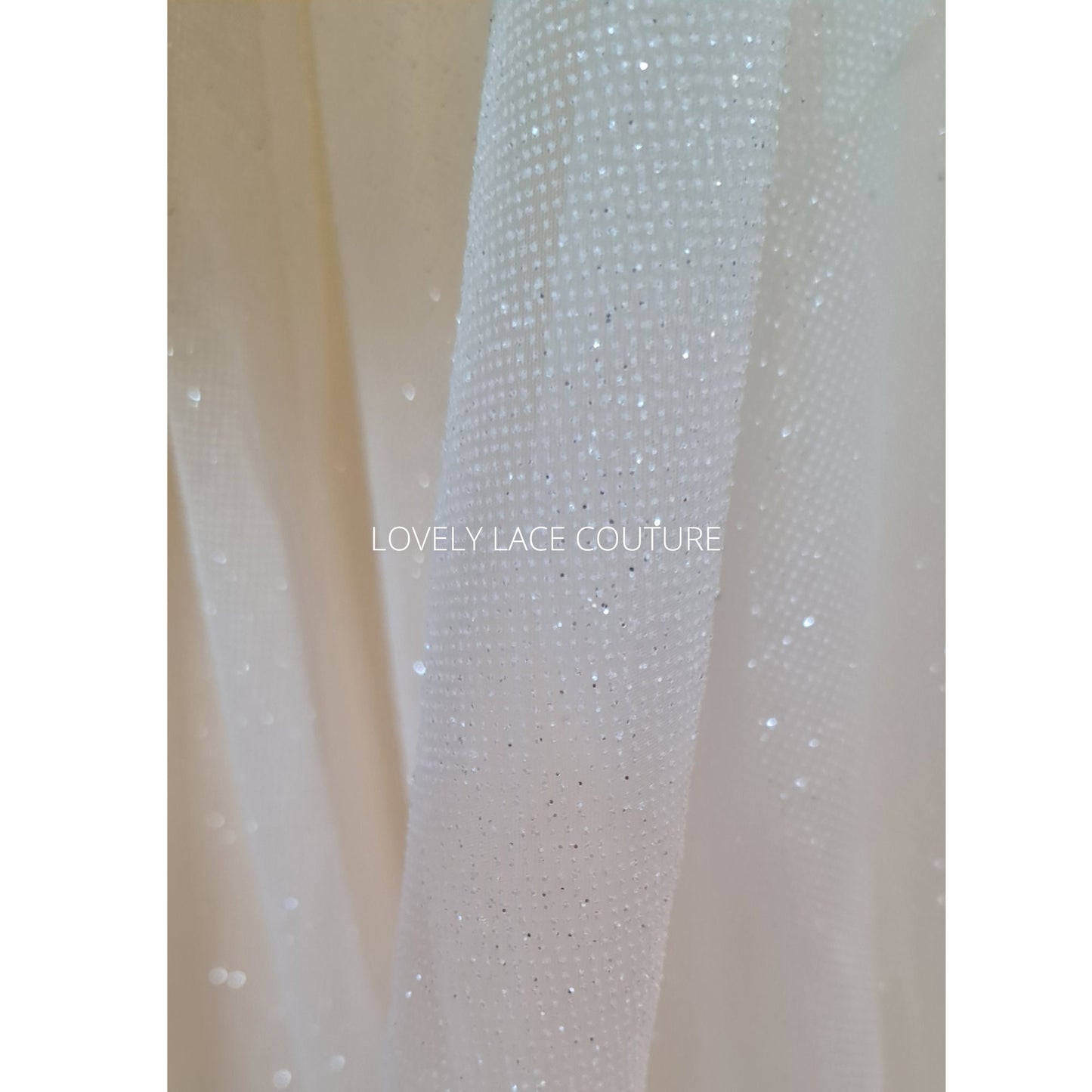 glitter tulle fabric in off-white color