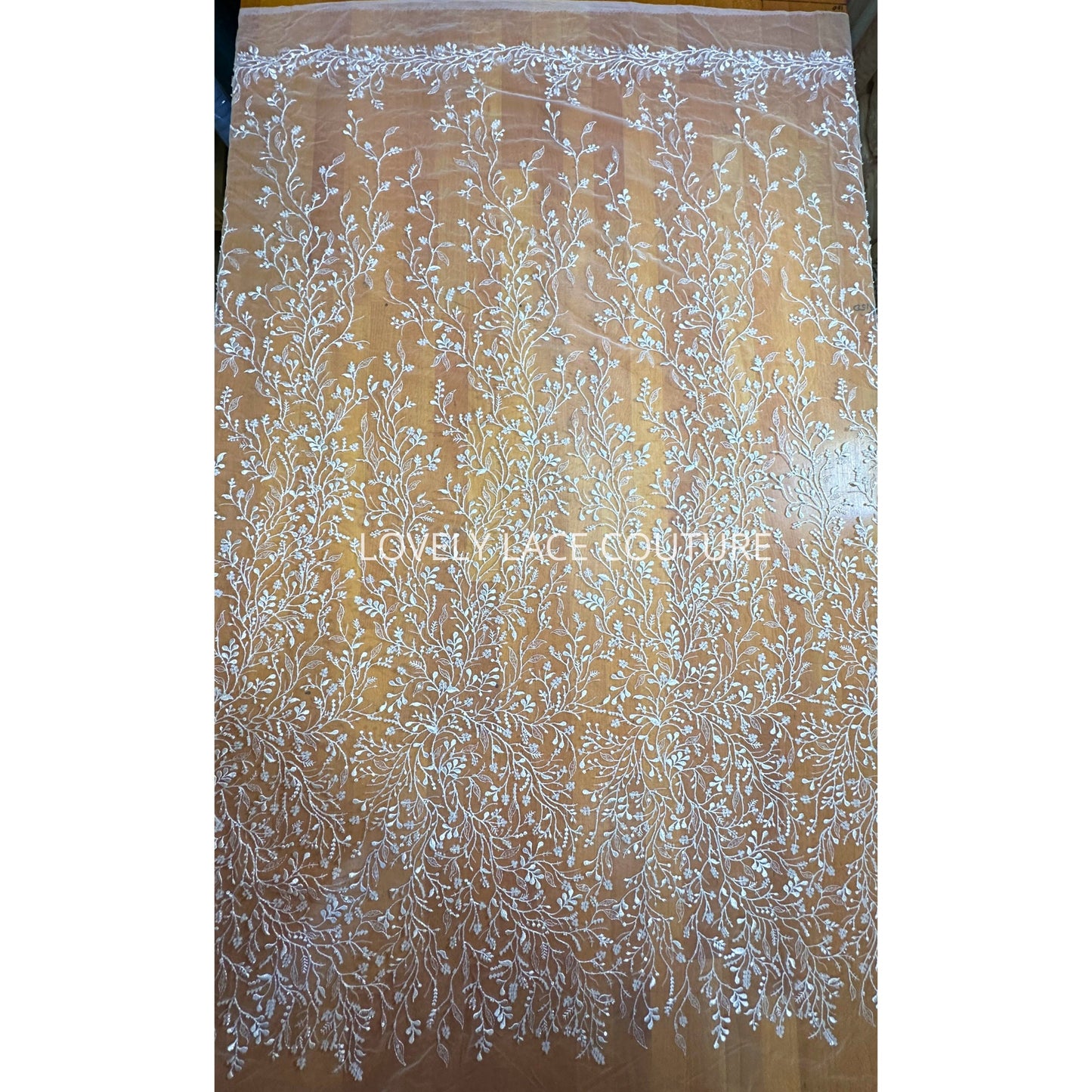 LL-1568, beautiful delicate lace fabric with leaf design in white color with beads and sequins for bridal or communion gowns, from 0,5m