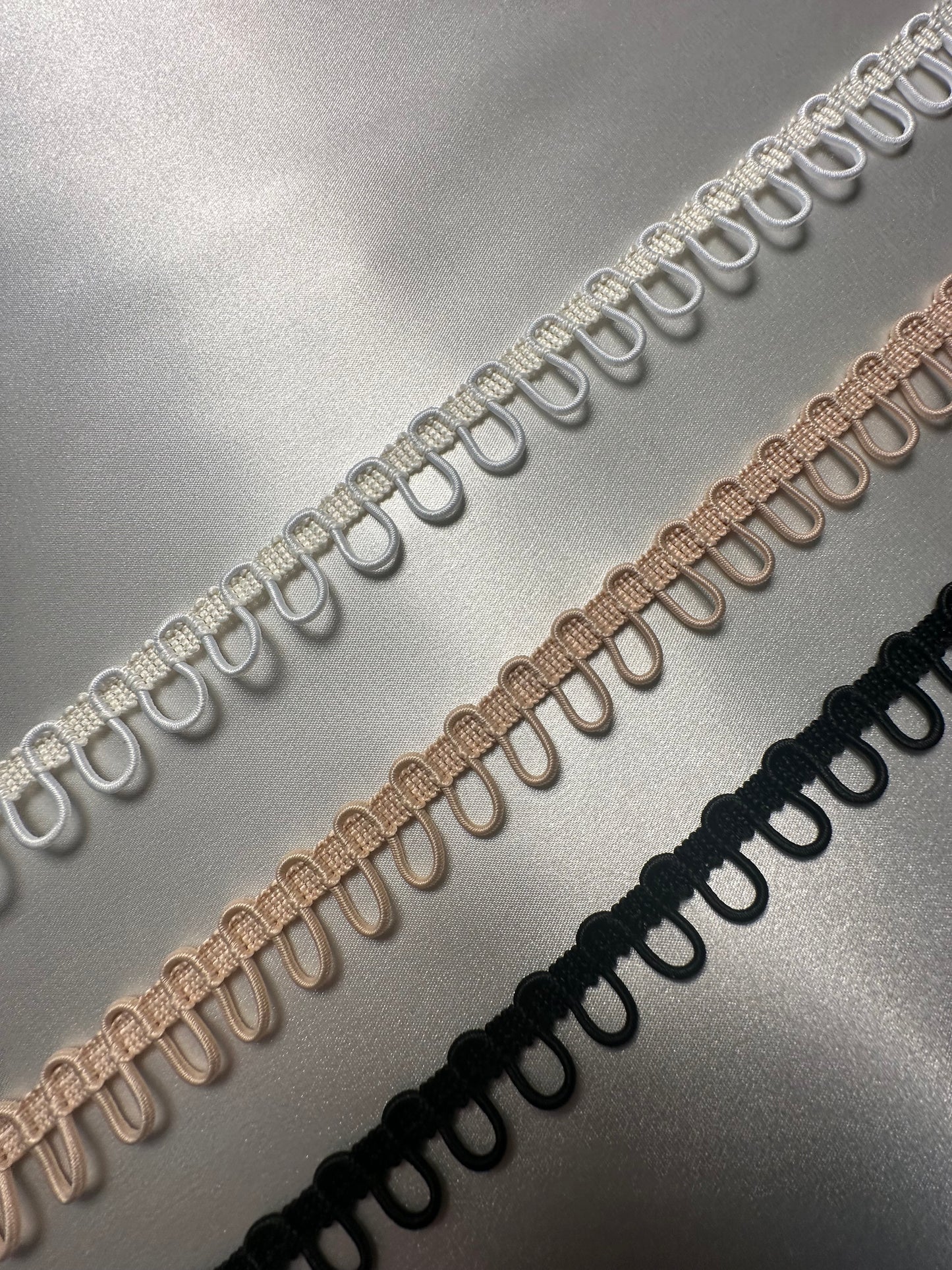 braided ribbon with elastic button loops in white, nude or black