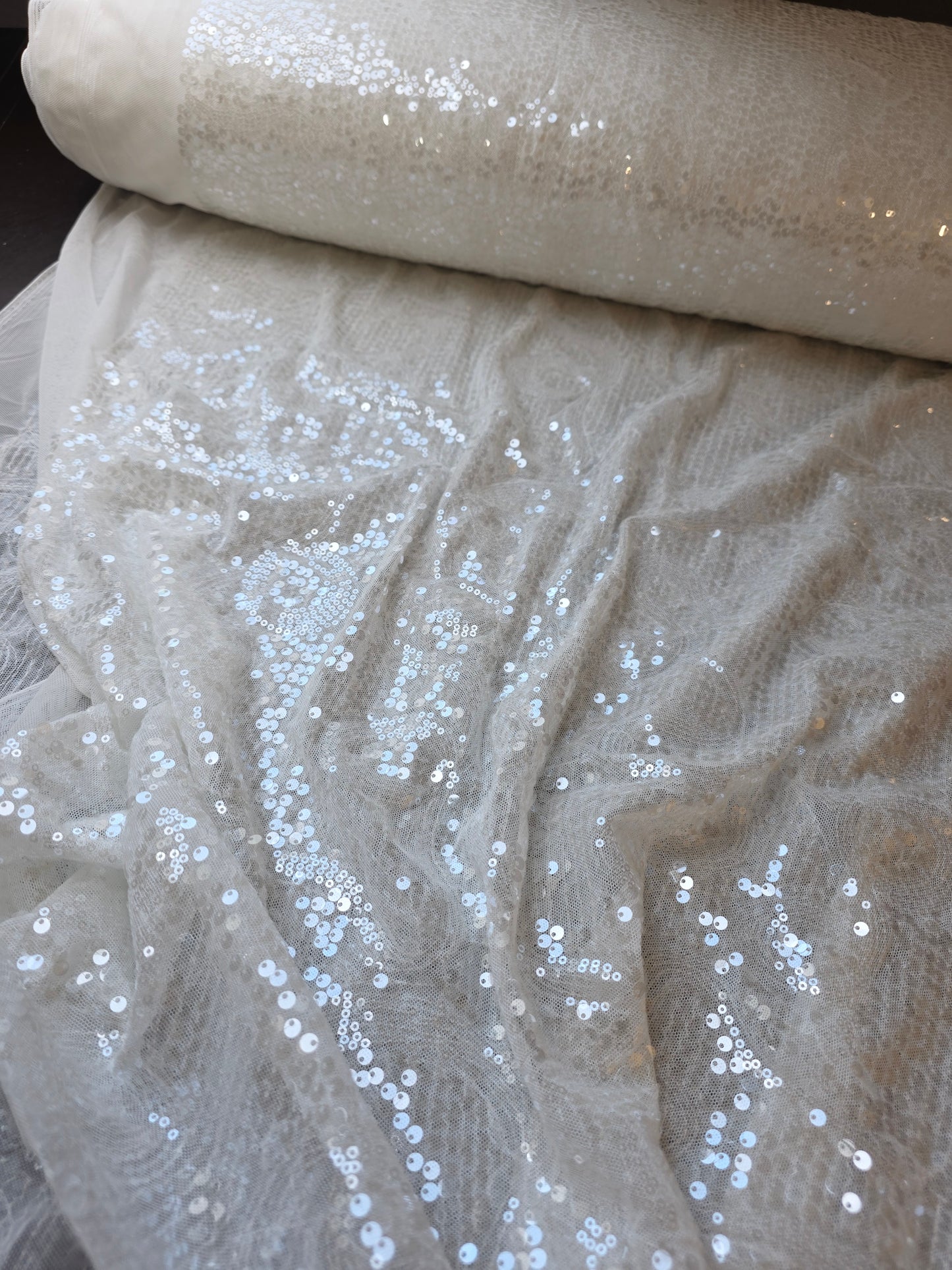 LL-1592, transparent meshfabric with big and small sequins in off-white color