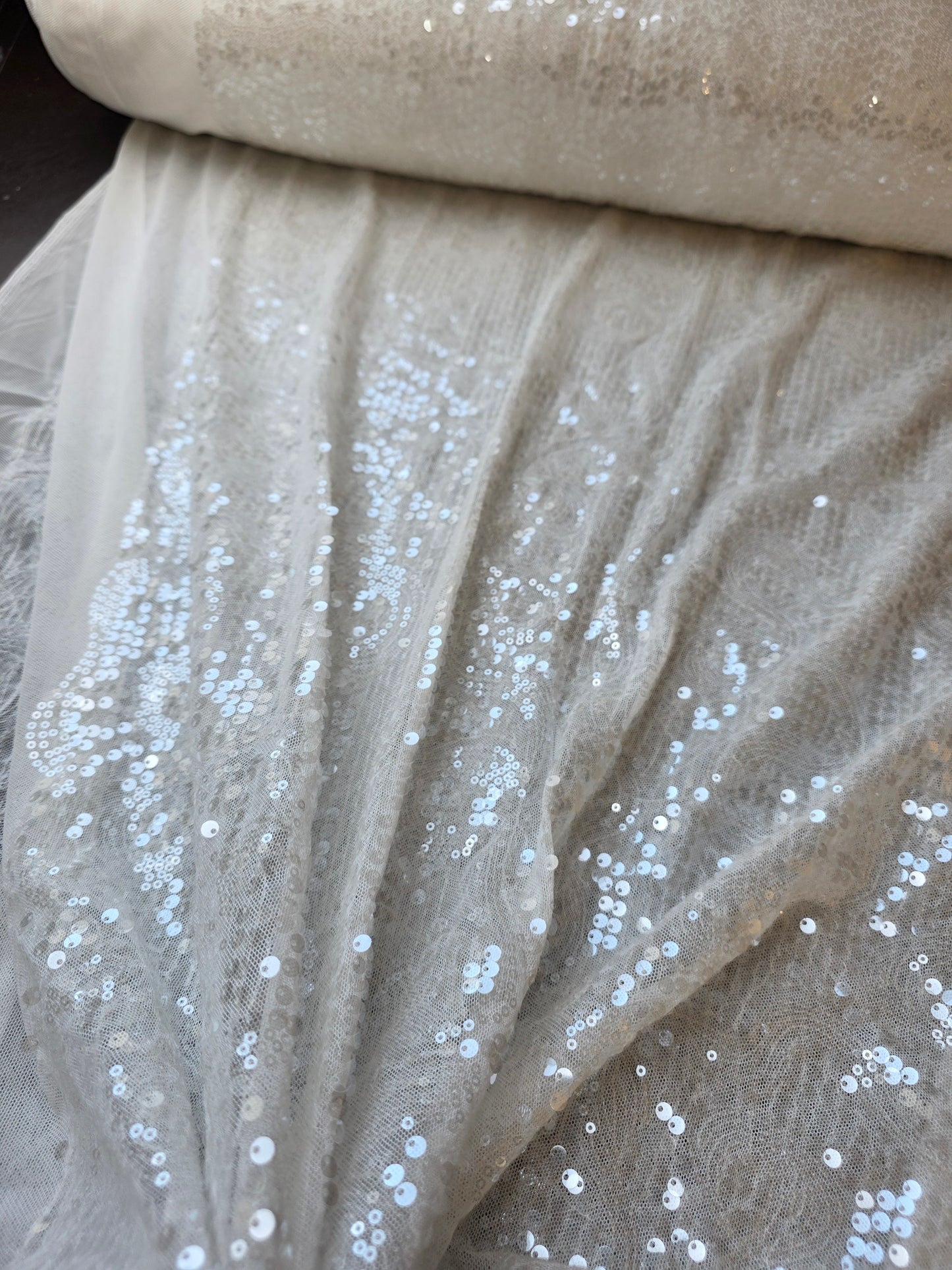 LL-1592, transparent meshfabric with big and small sequins in off-white color