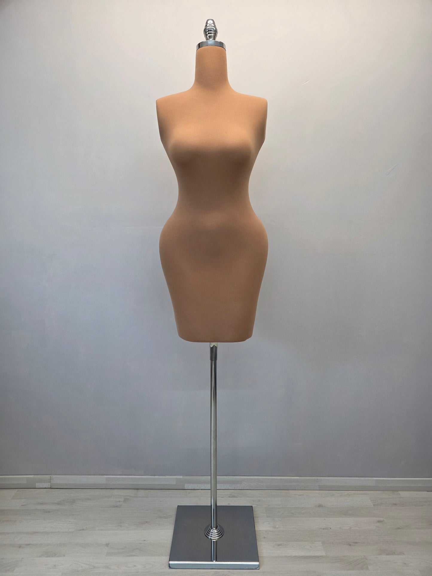 hourglass-shaped dress form, ideal for draping and presenting design ideas