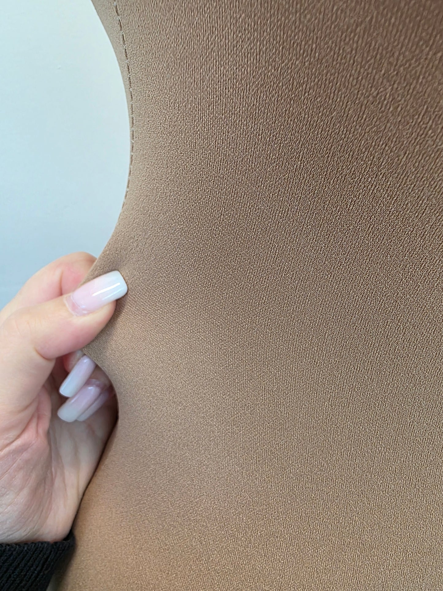 hourglass-shaped dress form, ideal for draping and presenting design ideas