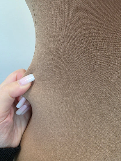 hourglass-shaped dress form, ideal for draping and presenting design ideas