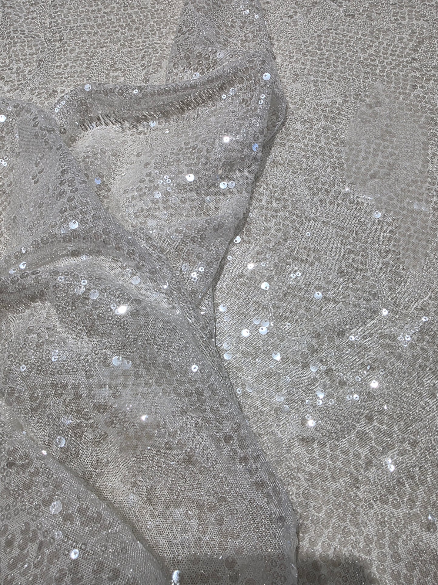 LL-1592, transparent meshfabric with big and small sequins in off-white color