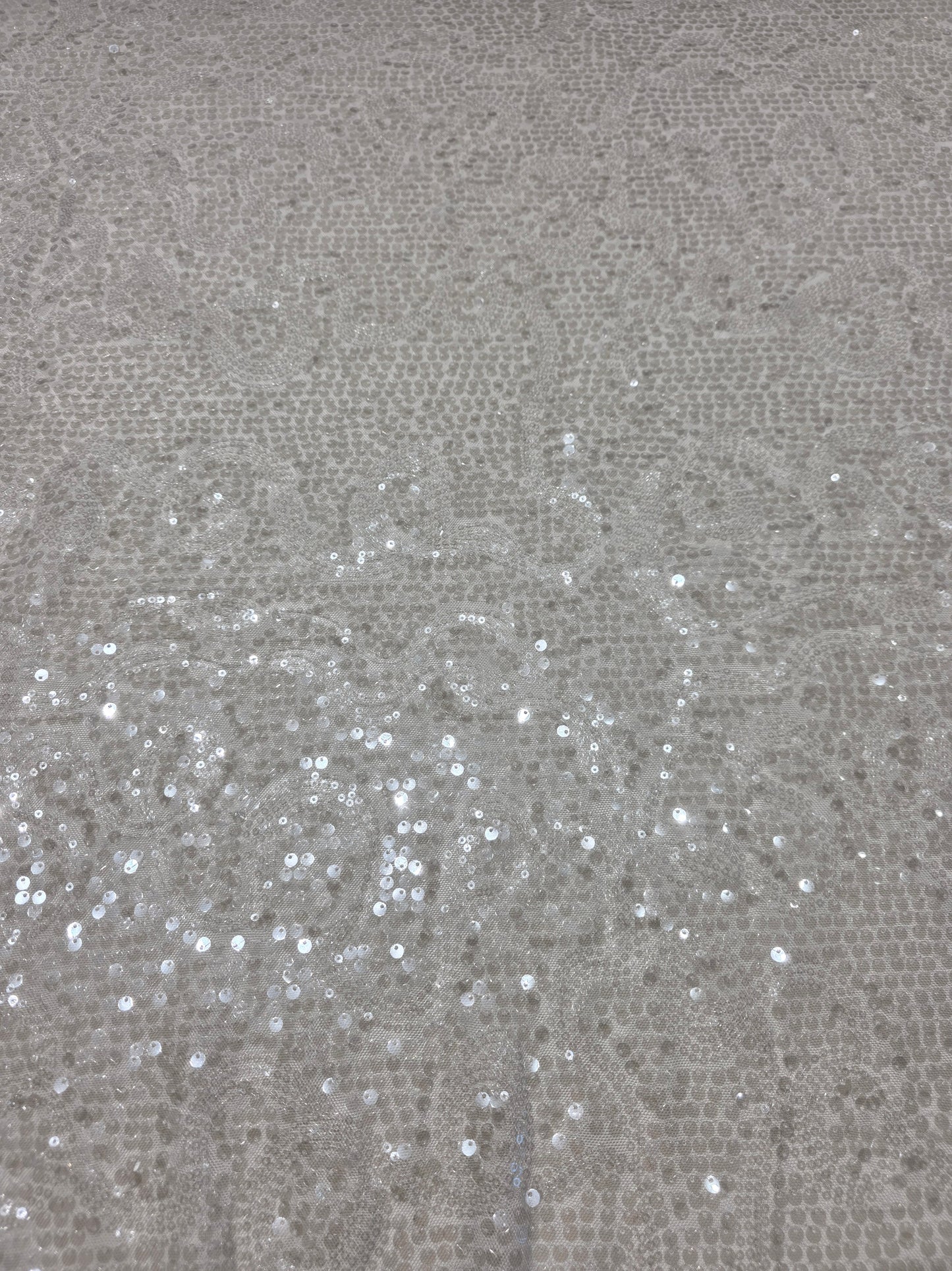 LL-1592, transparent meshfabric with big and small sequins in off-white color