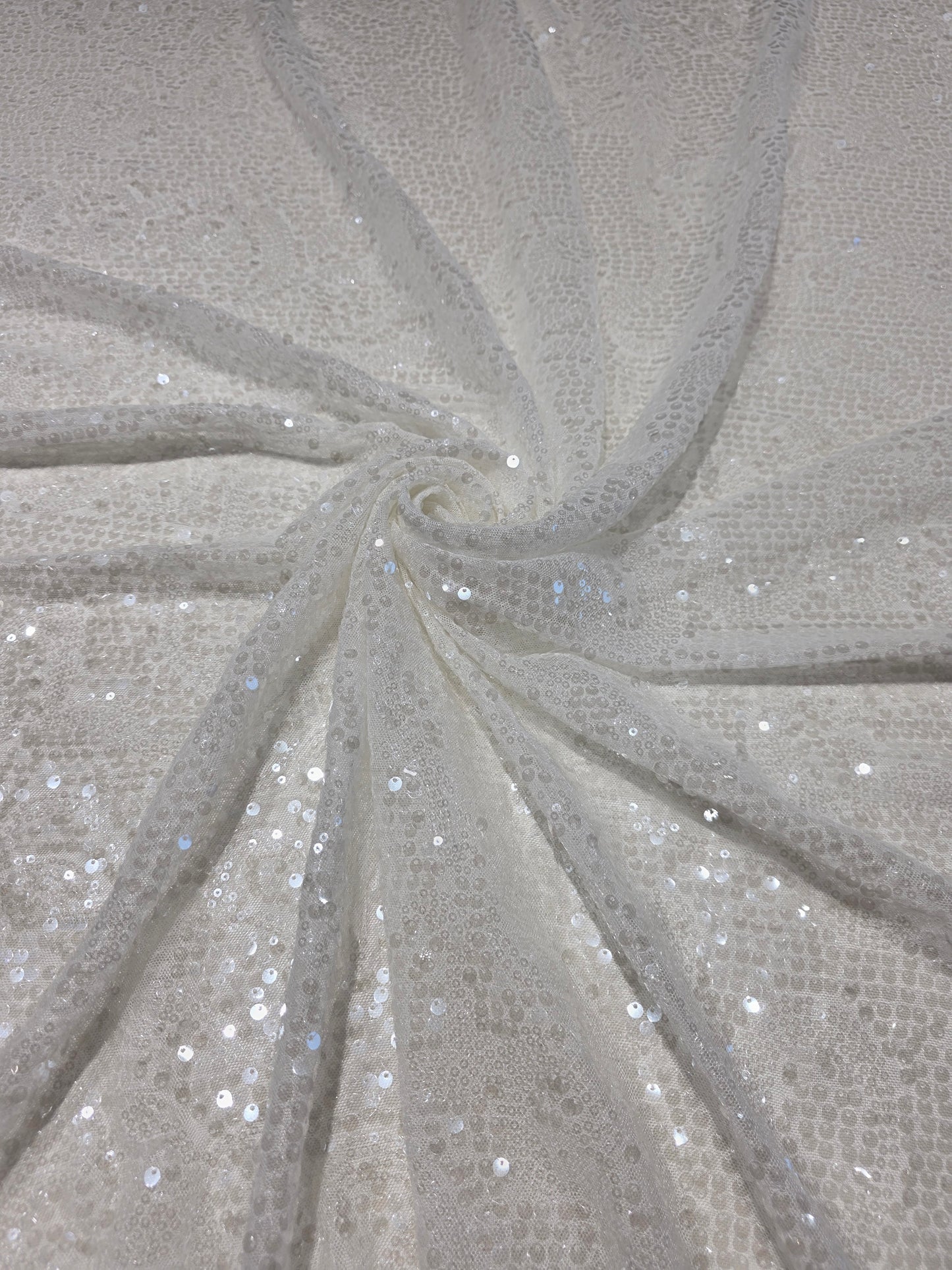LL-1592, transparent meshfabric with big and small sequins in off-white color