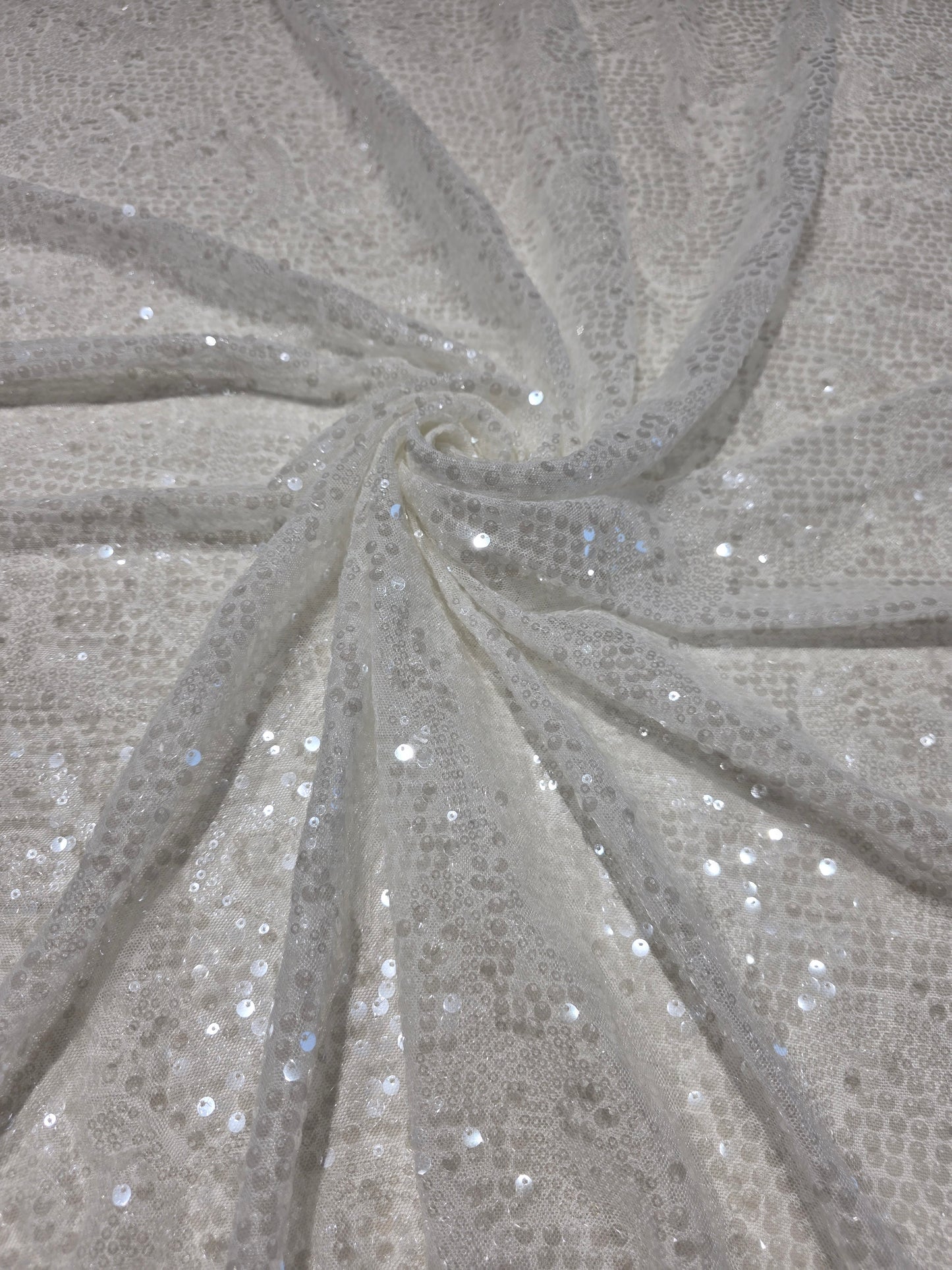 LL-1592, transparent meshfabric with big and small sequins in off-white color