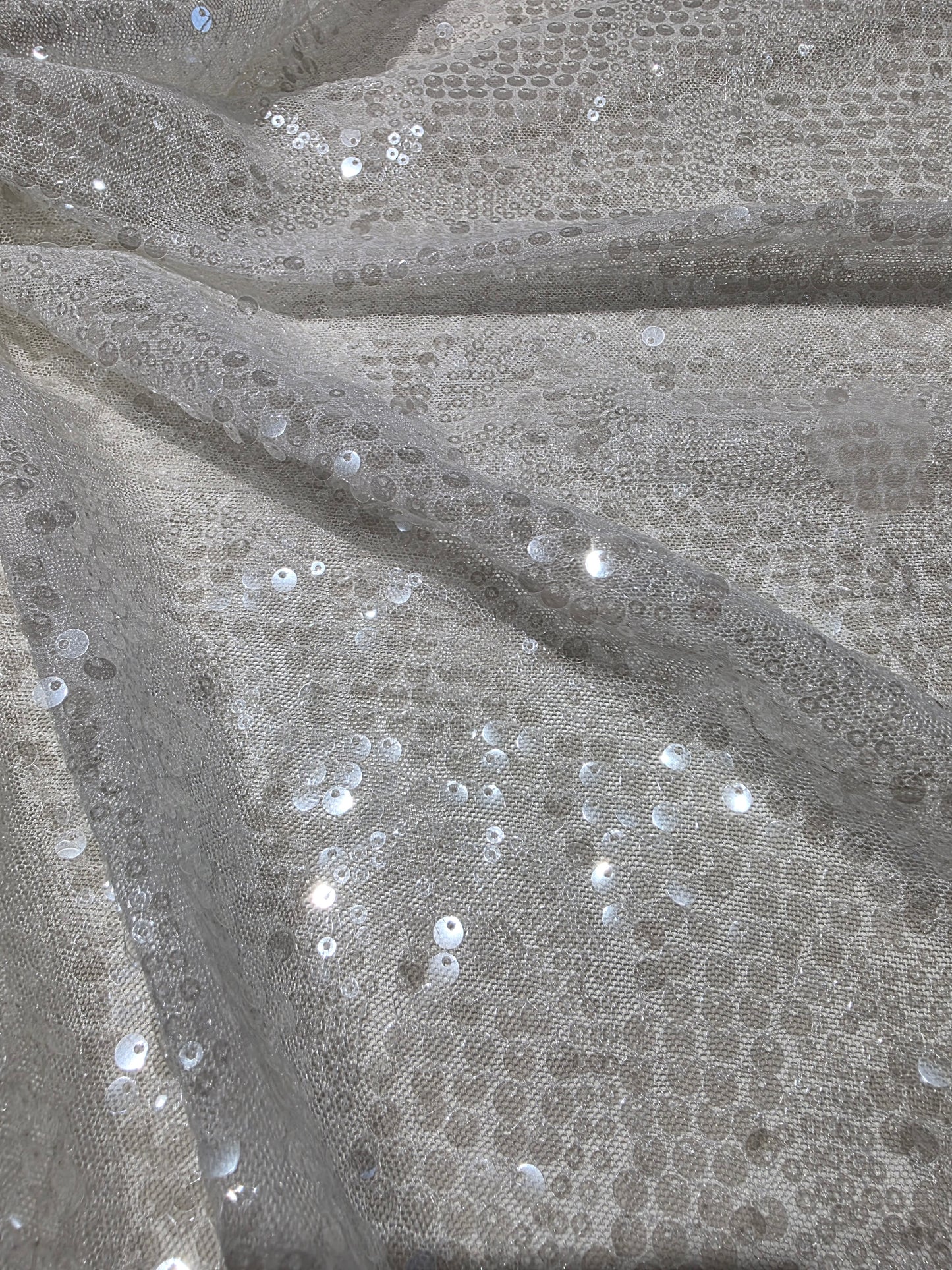 LL-1592, transparent meshfabric with big and small sequins in off-white color