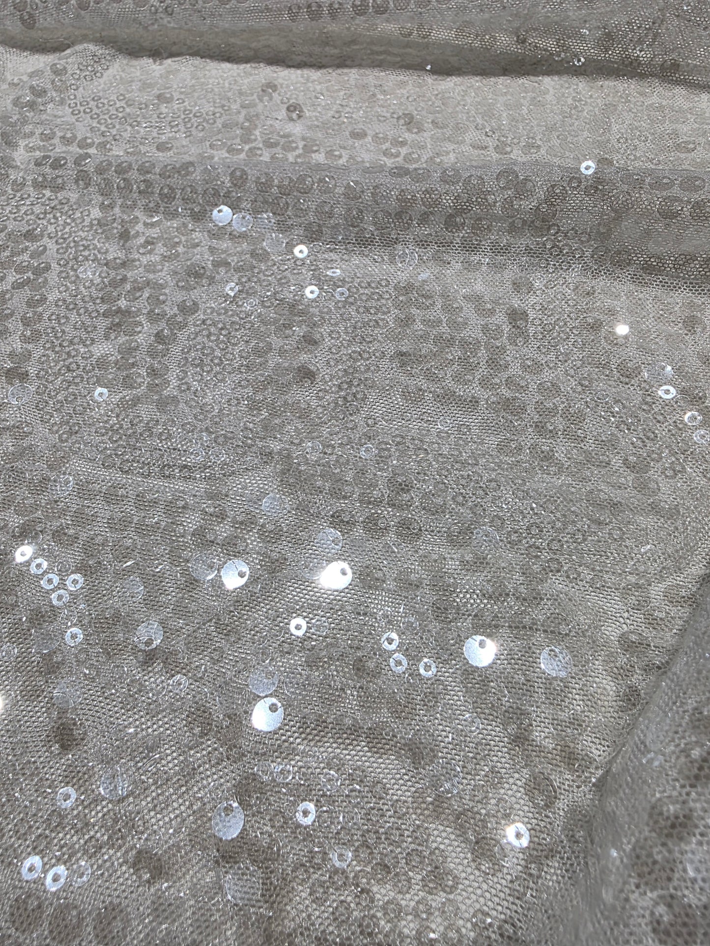 LL-1592, transparent meshfabric with big and small sequins in off-white color