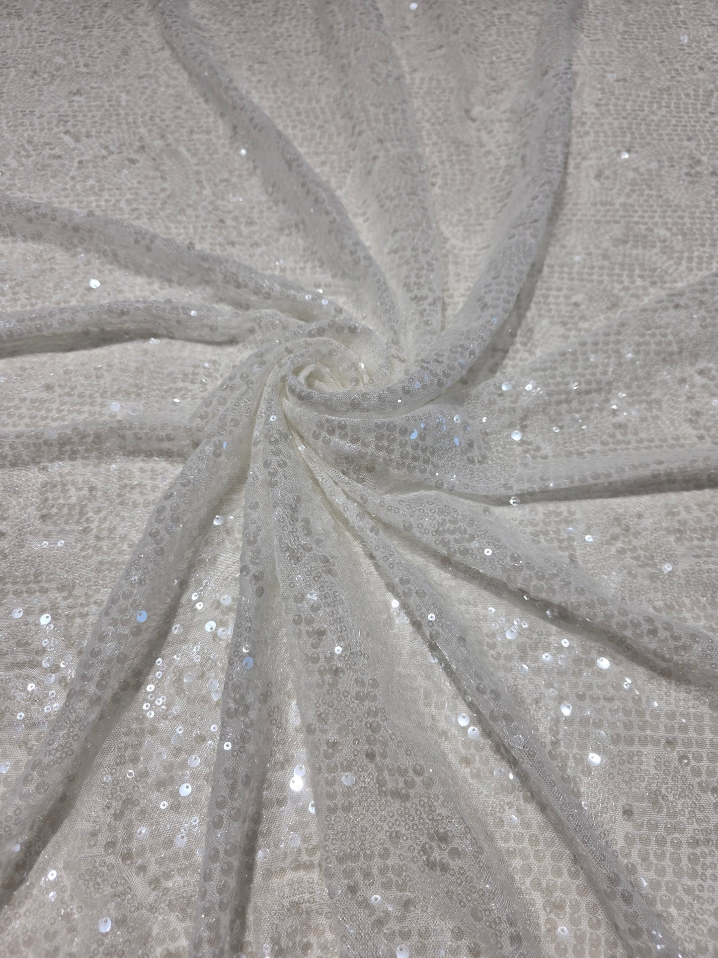 LL-1592, transparent meshfabric with big and small sequins in off-white color
