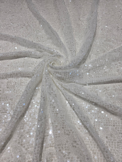 LL-1592, transparent meshfabric with big and small sequins in off-white color