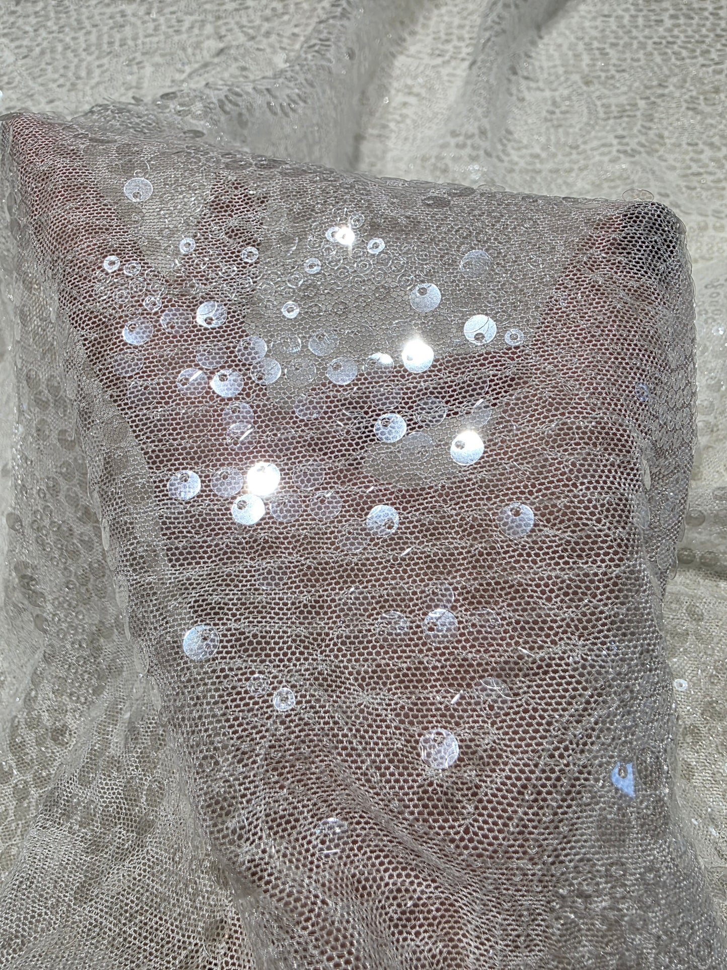 LL-1592, transparent meshfabric with big and small sequins in off-white color