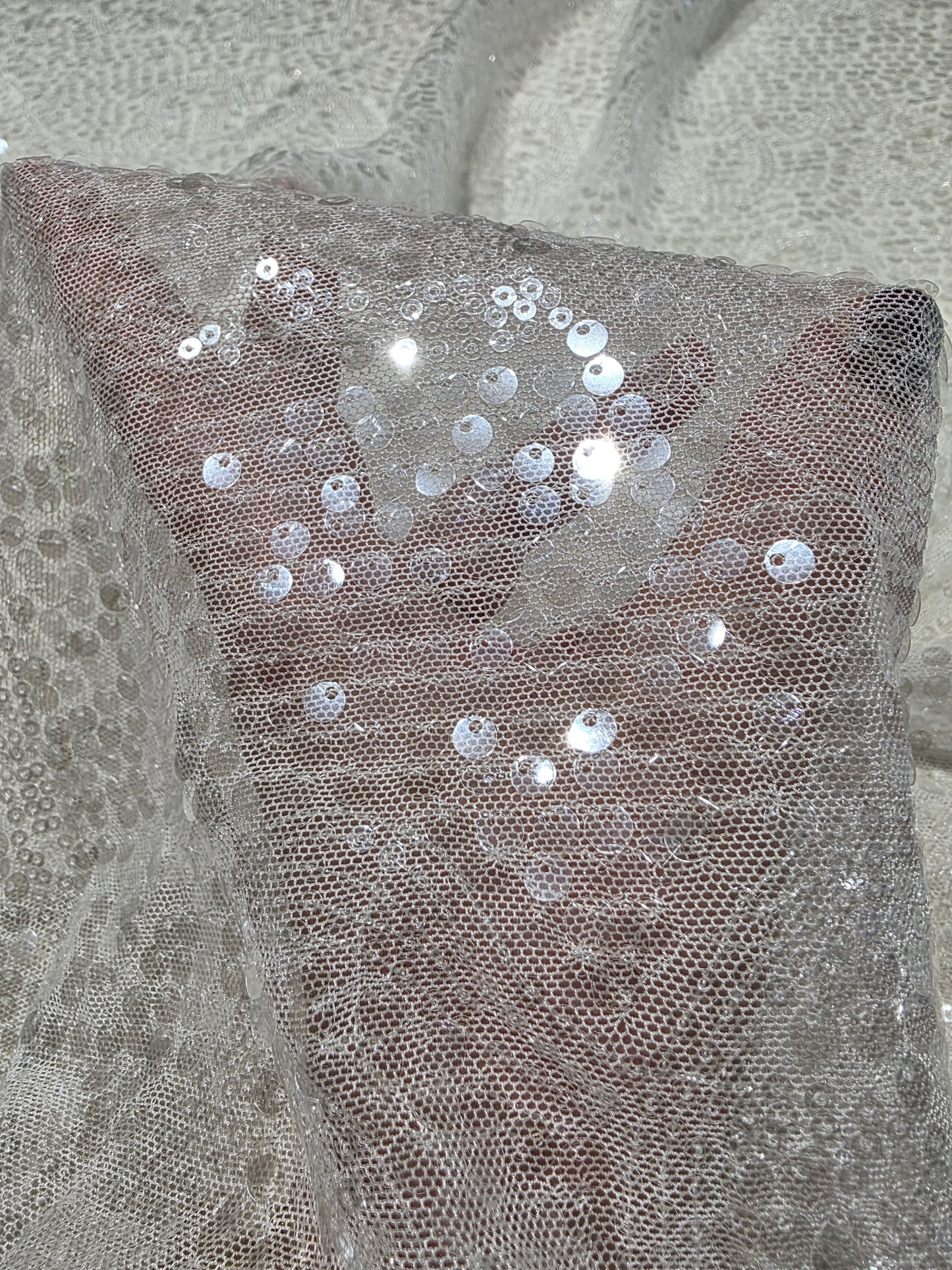 LL-1592, transparent meshfabric with big and small sequins in off-white color
