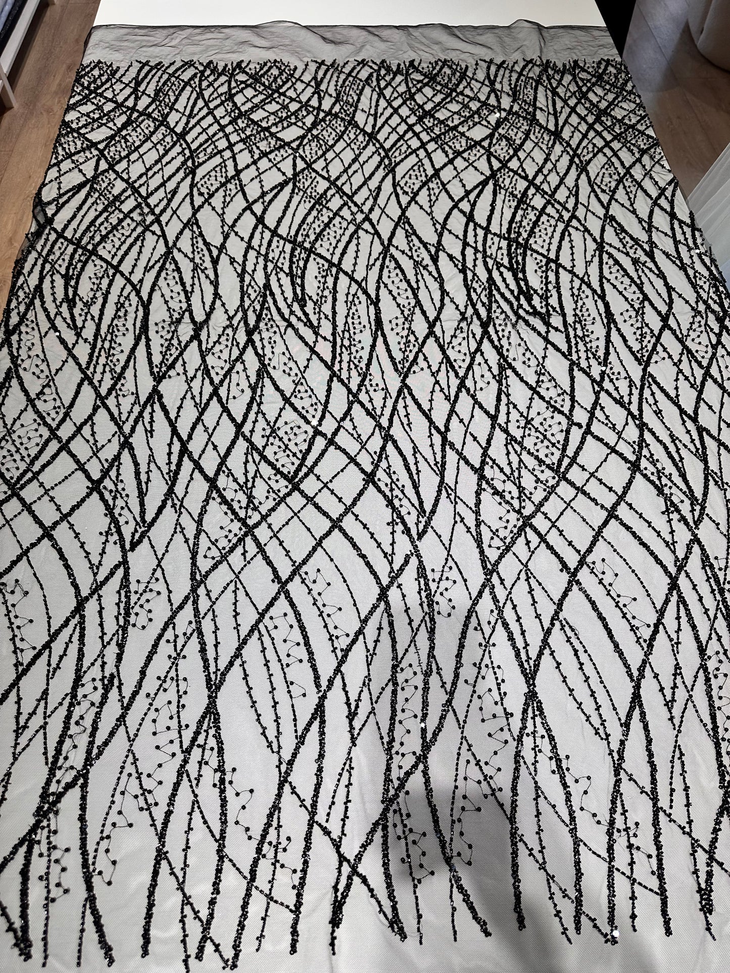 LL-1593, beaded black lace fabric with abstract wave design