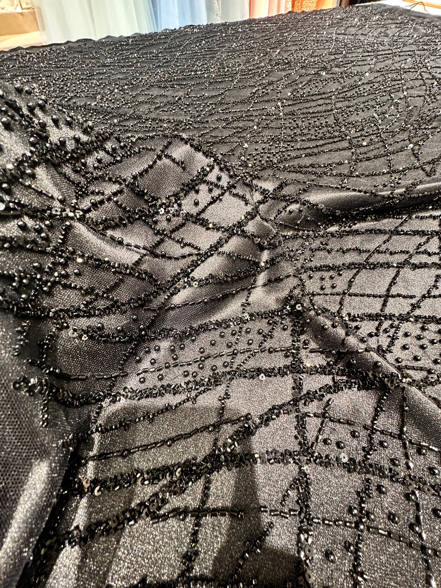 LL-1593, beaded black lace fabric with abstract wave design