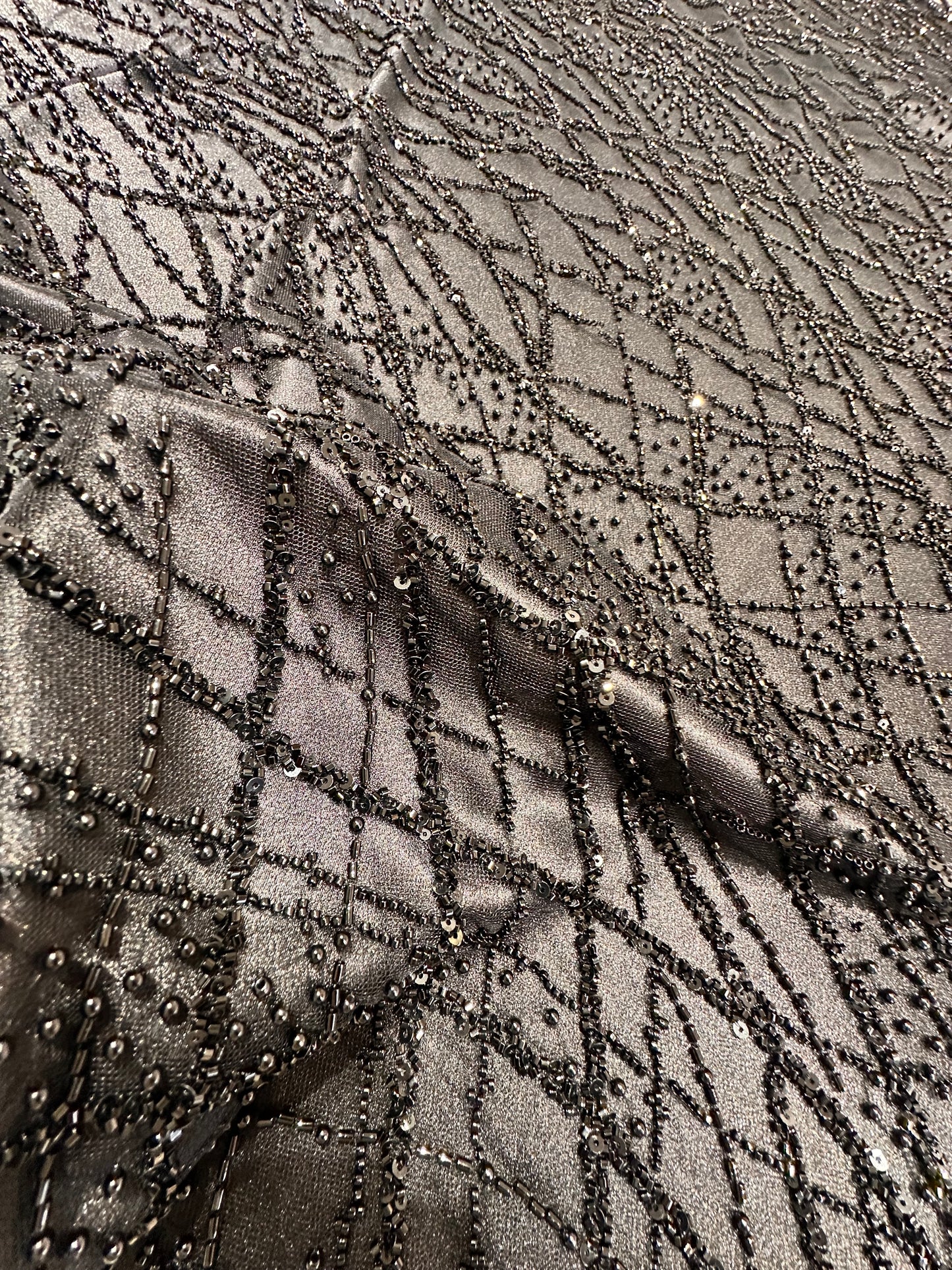 LL-1593, beaded black lace fabric with abstract wave design