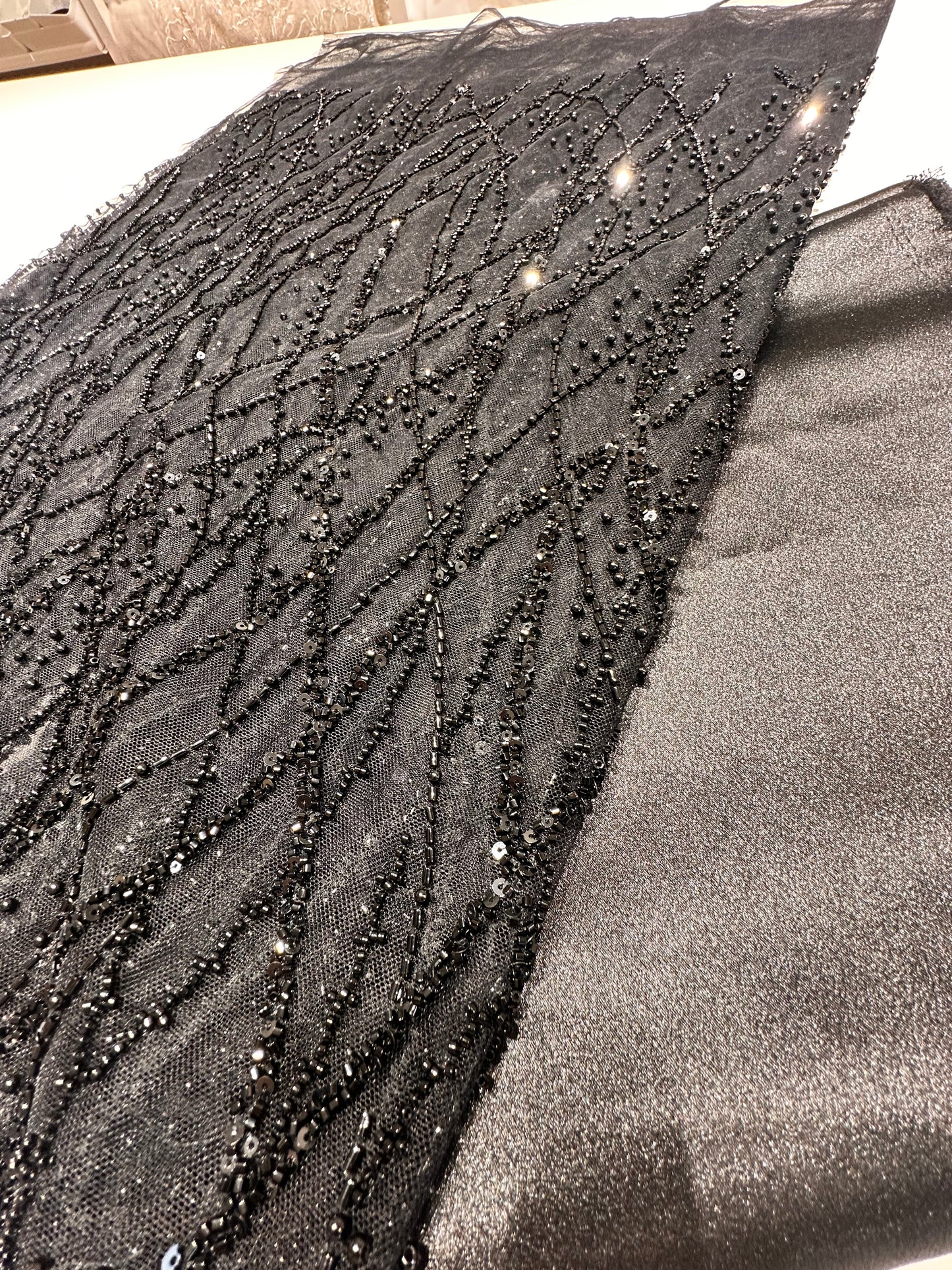 LL-1593, beaded black lace fabric with abstract wave design
