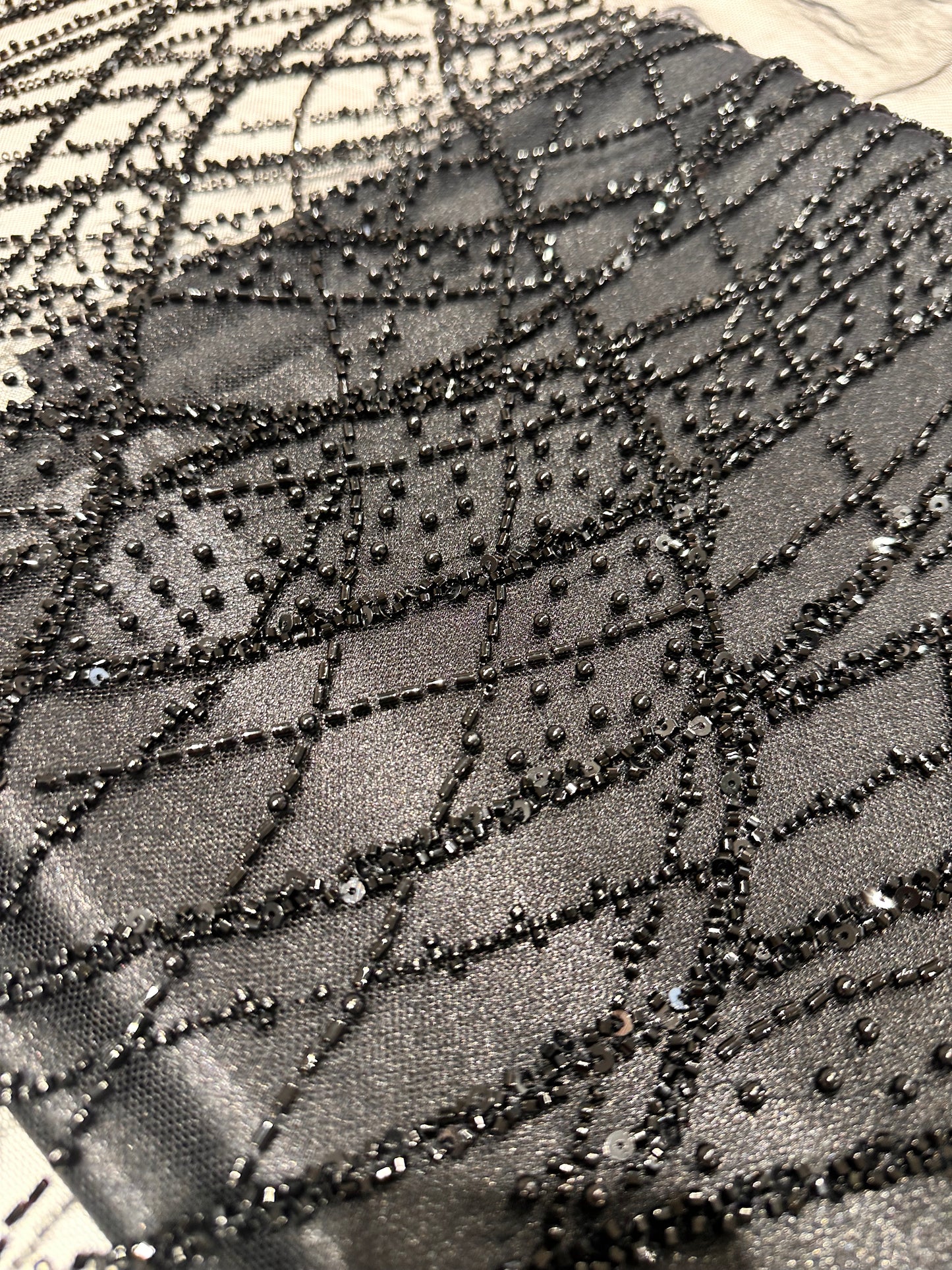 LL-1593, beaded black lace fabric with abstract wave design