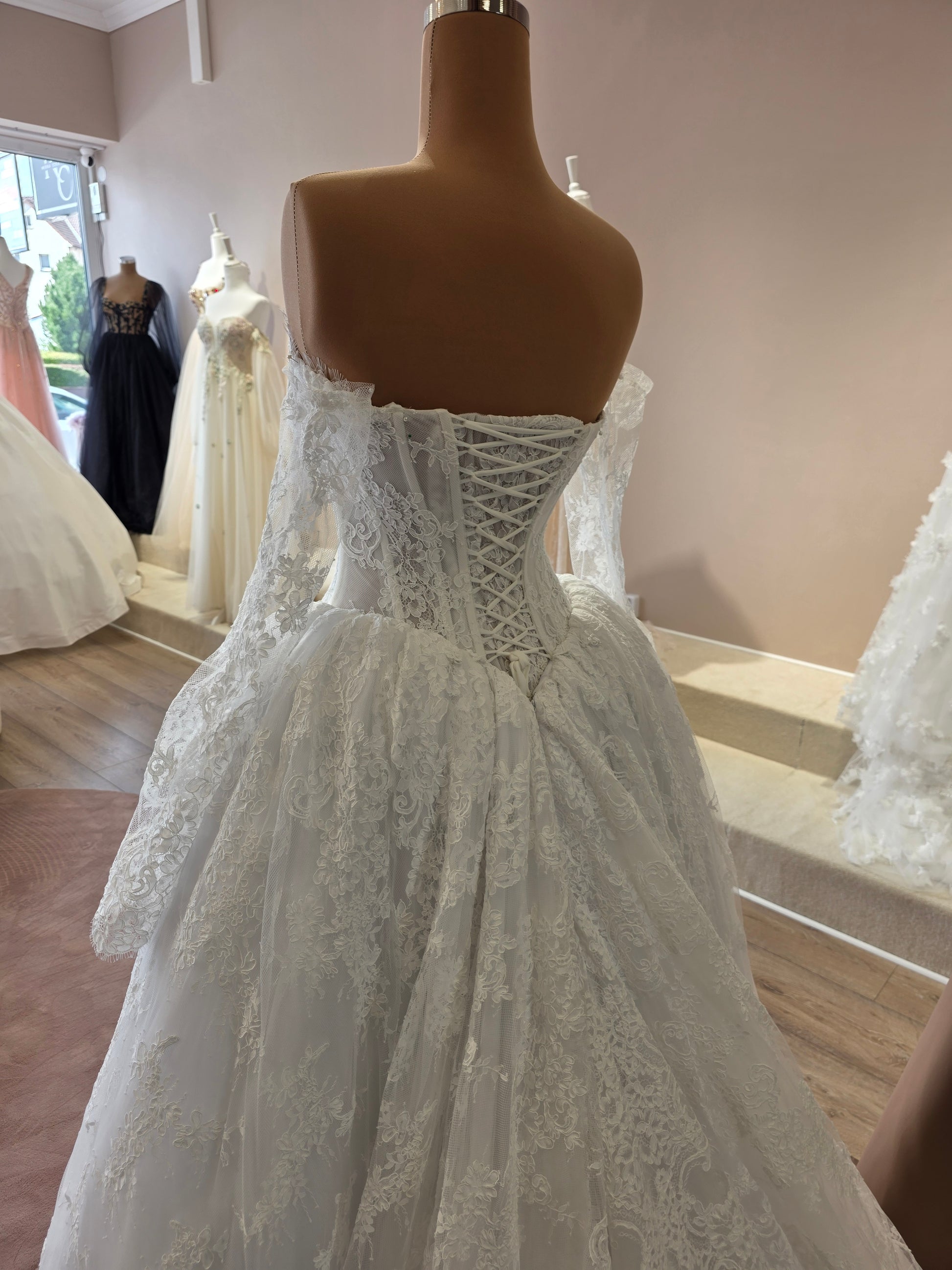 cord eyelash lace fabric used in a dress