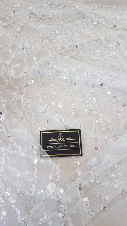 Gorgeous fabric in modern design, white tulle fabric with shiny sequins and beads in silver color, bridal tulle, wedding tulle LL-1147