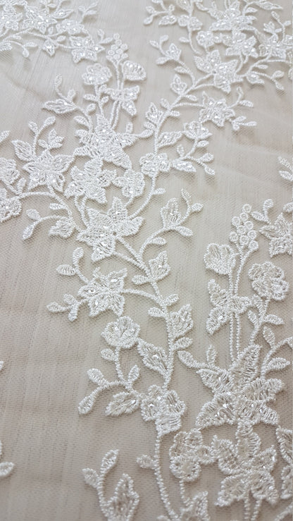 off-white lace fabric with flower pattern