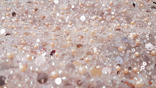 lace fabric in rosegold color