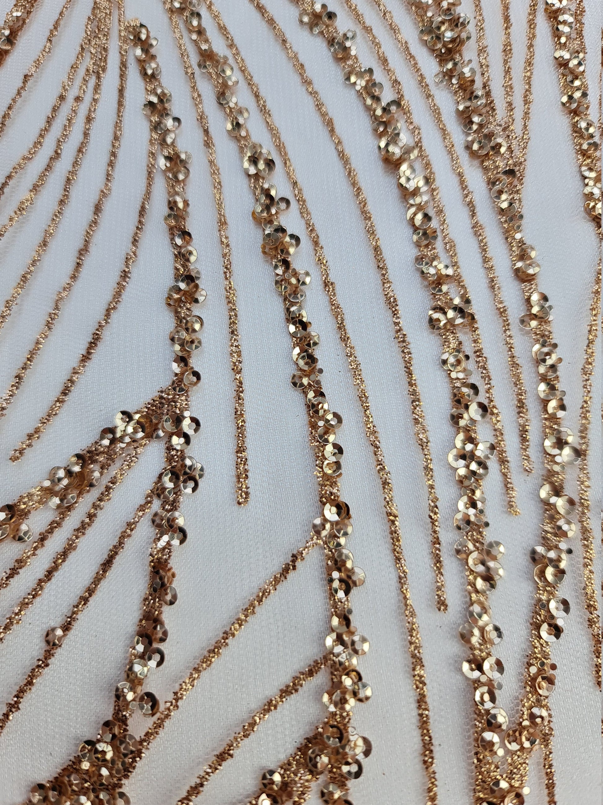 Glitter fabric with sequins in roségold, gold or blue color, net fabric with abstract design