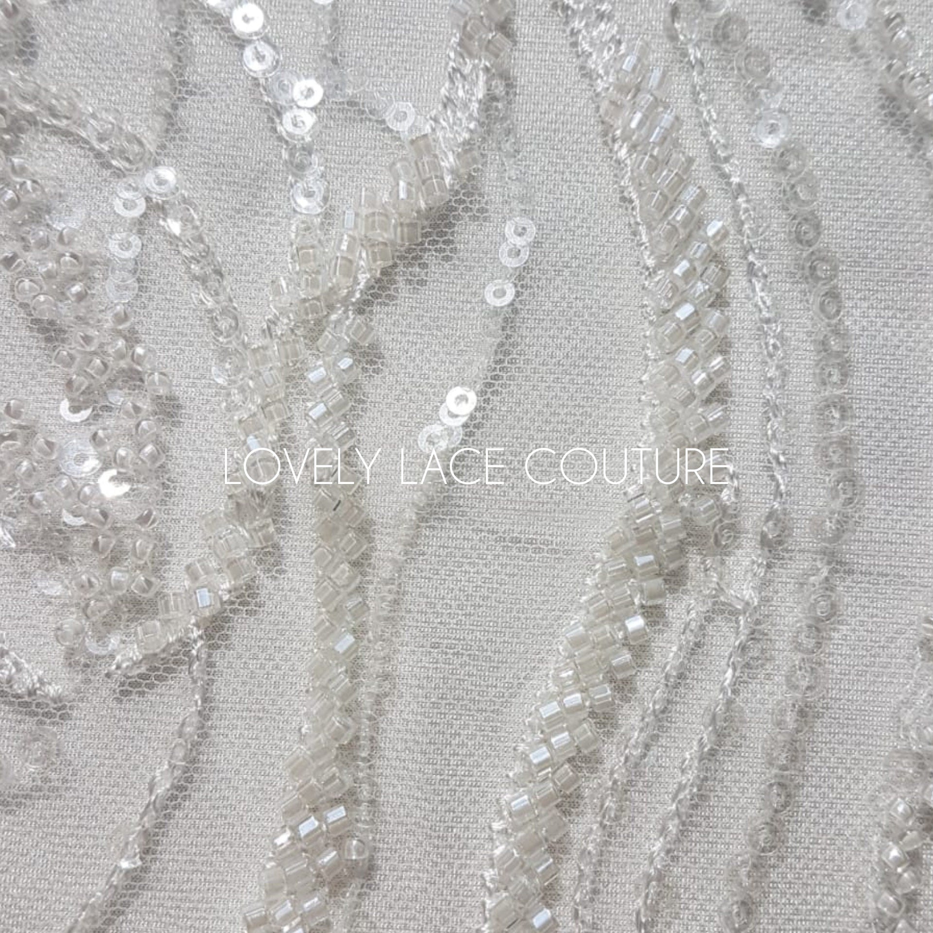 LL-1374, luxurious bridal lace fabric with modern abstract wave pattern in off-white color, starts at 0,5Meter