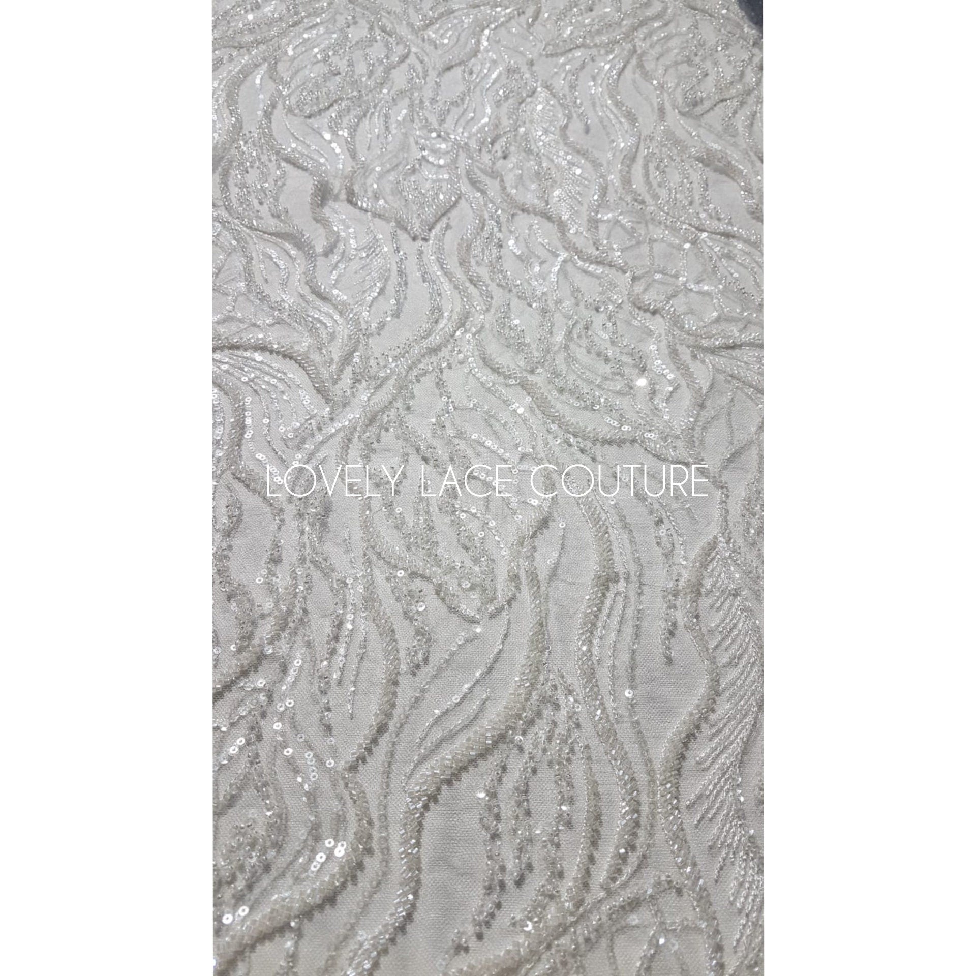 LL-1374, luxurious bridal lace fabric with modern abstract wave pattern in off-white color, starts at 0,5Meter