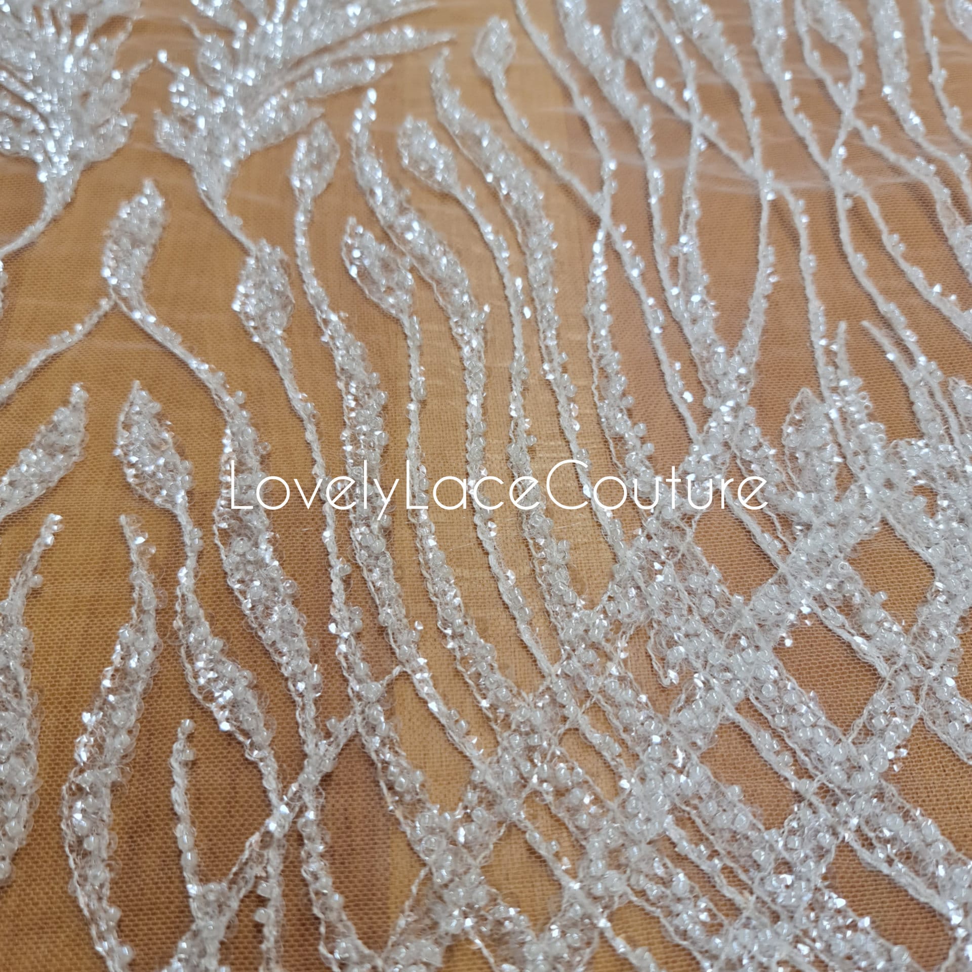 beaded lace fabric in off-white color