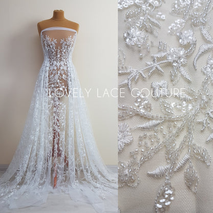 floral lace fabric in off-white color with beads and transparent sequins