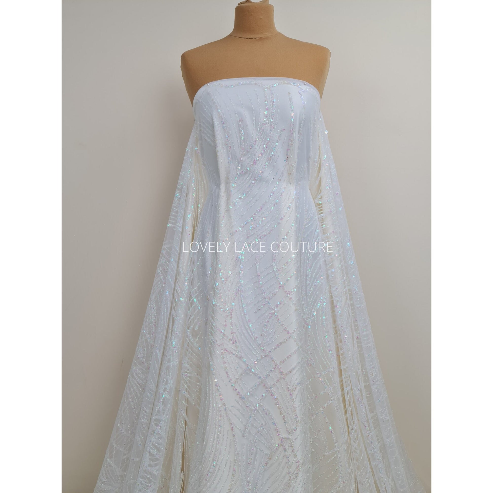 Glitter fabric with sequins in white color, net fabric with abstract design LL-1401