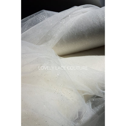 glitter tulle fabric for bridal veils and wedding dresses in off-white and ivory color