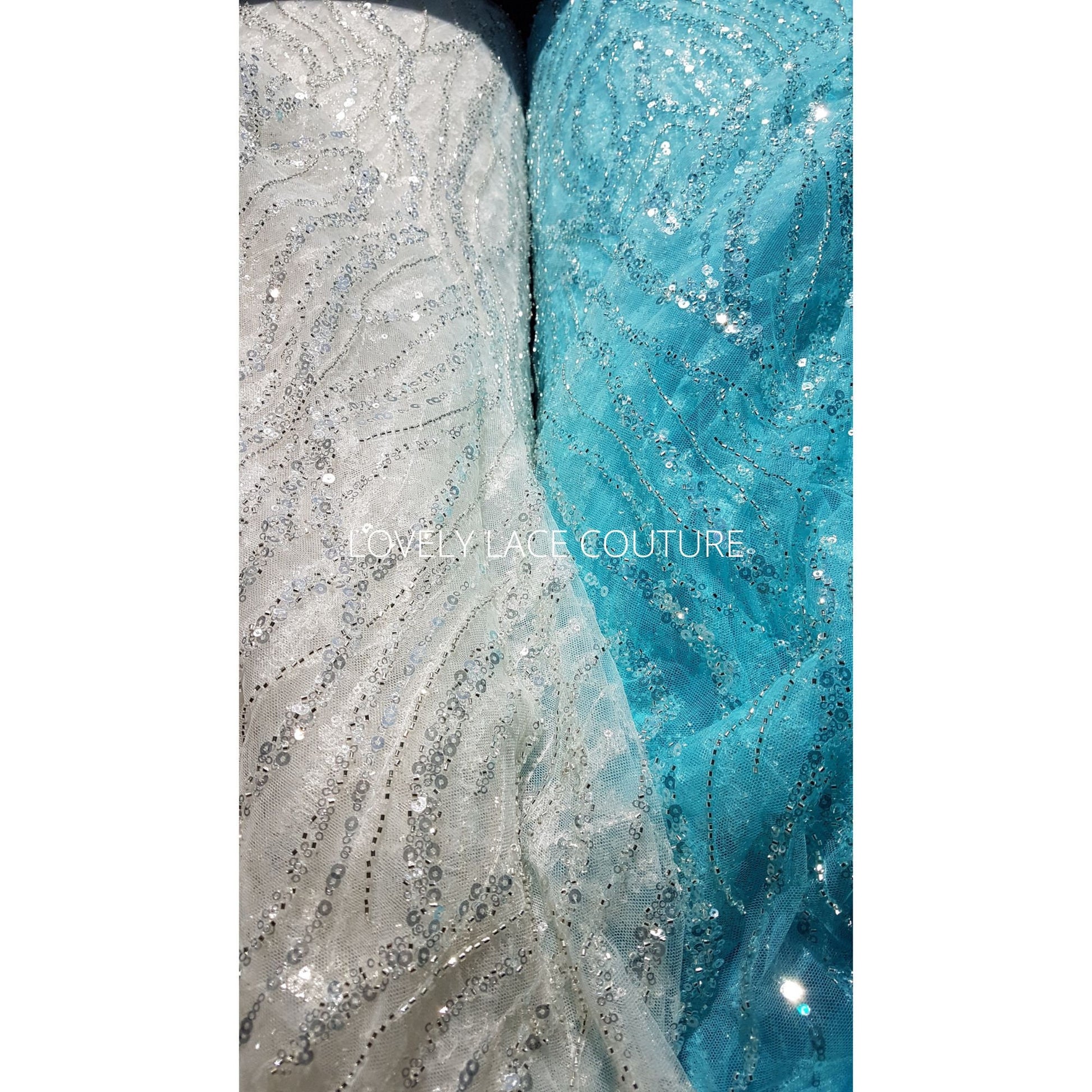 lace fabric wave pattern in off-white and turqouise color