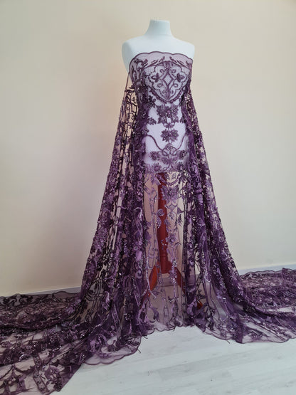 geometrical design, lace fabric draped on dressform