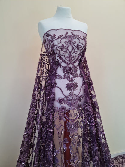 close up from upper part, lace fabric in purple color on dressform