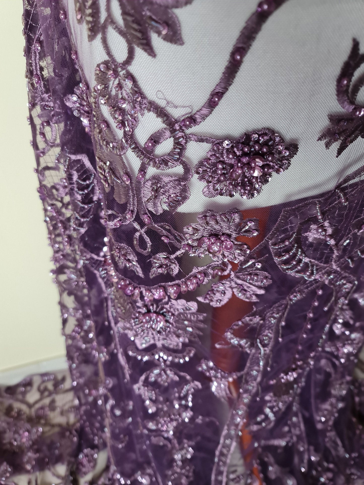 close up from beads and sequins in purple color