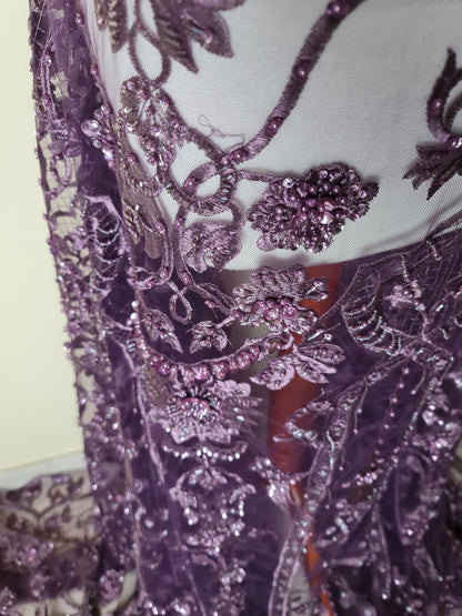 close up from beads and sequins in purple color