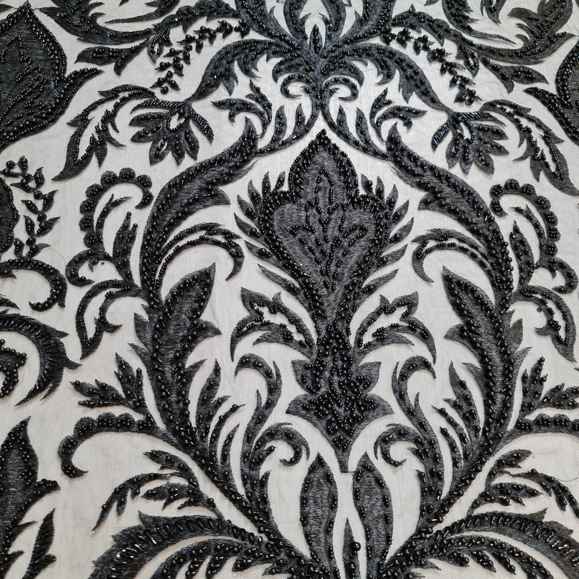 black lace with beads and sequins, ornamental design, closer picture
