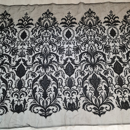 full pattern of black lace fabric with ornamental design